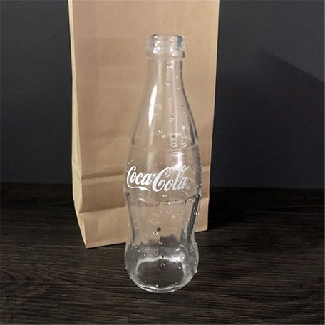 Vanishing coke bottle (empty)